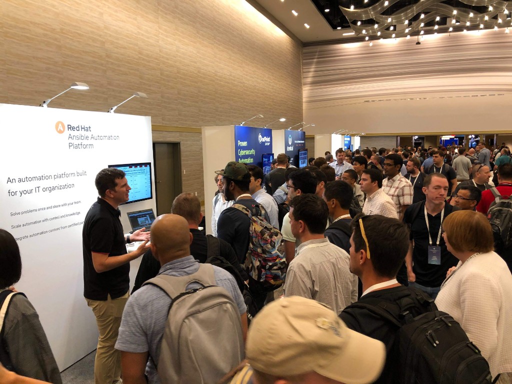 Crowd at the Ansible booth — AnsibleFest, Atlanta, 2019